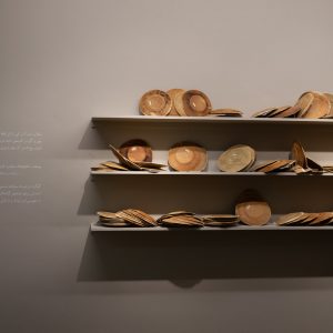 installation of 700 plates made of bread/ wooden shelves, bread dough,variation of 1000-1699